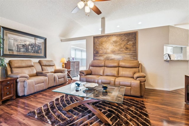 1721 Park View Pl, Edmond, OK 73003 - living area with ceiling fan, wood finished floors, a textured ceiling, baseboards, and vaulted ceiling
