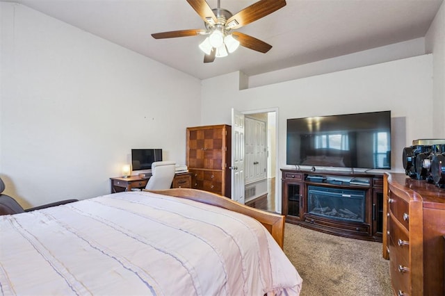 1721 Park View Pl, Edmond, OK 73003 - bedroom with carpet flooring and a ceiling fan