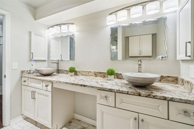 1721 Park View Pl, Edmond, OK 73003 - full bathroom featuring baseboards and double vanity