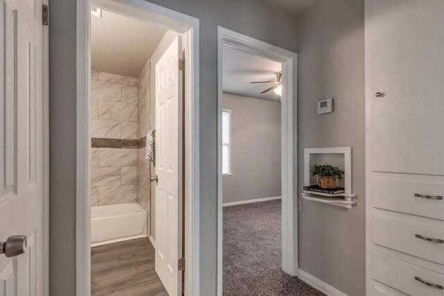 4017 Mallard Dr, Oklahoma City, OK 73115 - hallway featuring baseboards