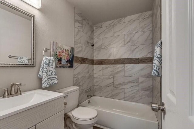 4017 Mallard Dr, Oklahoma City, OK 73115 - full bath featuring toilet, tub / shower combination, and vanity