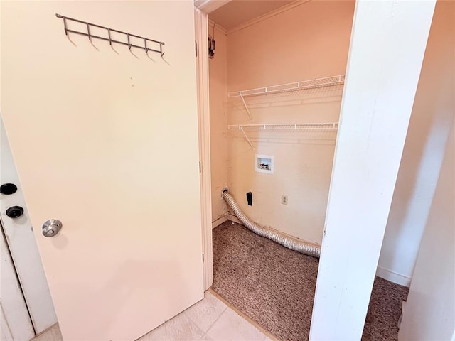1710 W Chickasha Ave, Chickasha, OK 73018 - laundry room with hookup for a washing machine and light colored carpet
