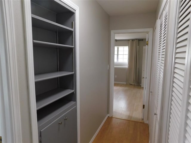 5737 NW 31st St, Oklahoma City, OK 73122 - corridor with wood finished floors and baseboards