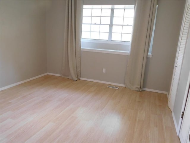 5737 NW 31st St, Oklahoma City, OK 73122 - unfurnished bedroom featuring light wood finished floors and baseboards