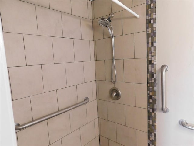 5737 NW 31st St, Oklahoma City, OK 73122 - bathroom featuring a tile shower