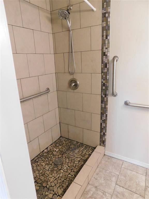 5737 NW 31st St, Oklahoma City, OK 73122 - full bath featuring tiled shower and tile patterned flooring