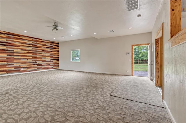 1126 SW 19th St, Oklahoma City, OK 73108 - carpeted spare room with a ceiling fan, healthy amount of natural light, baseboards, and recessed lighting