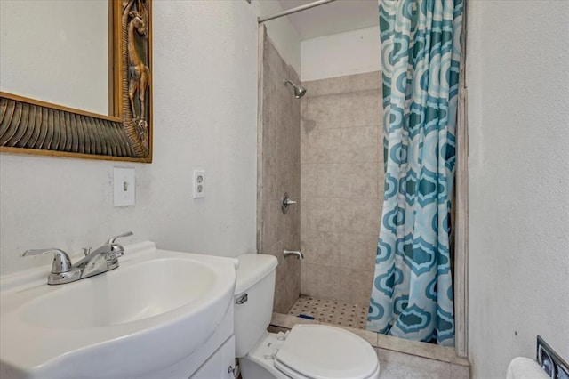1126 SW 19th St, Oklahoma City, OK 73108 - full bath with a stall shower, a textured wall, toilet, and vanity
