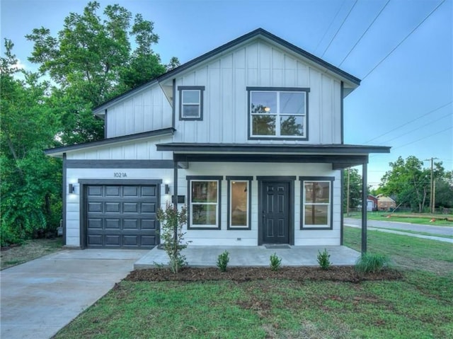 1021 NE 18th St, Oklahoma City, OK 73111 - modern inspired farmhouse featuring board and batten siding, covered porch, driveway, a garage, and a front lawn