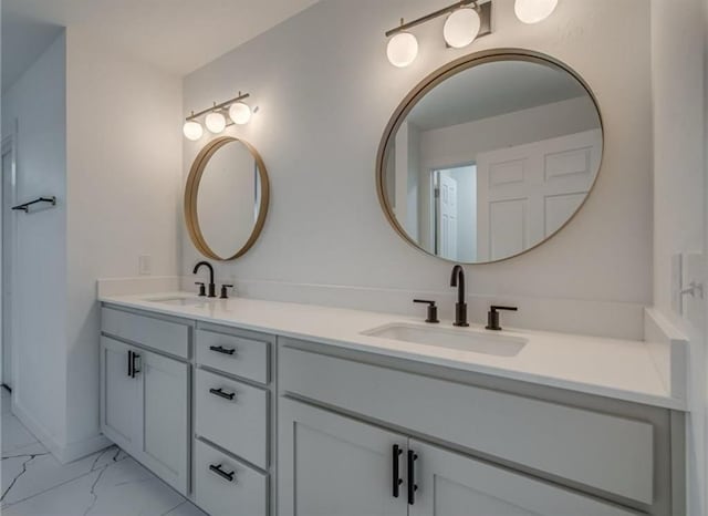 1021 NE 18th St, Oklahoma City, OK 73111 - full bath with marble finish flooring and double vanity