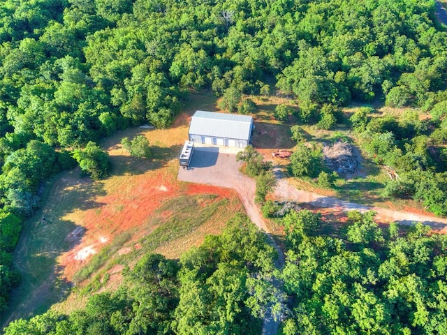 6301 144th Ave NE, Newalla, OK 74857 - view of property location with a heavily wooded area