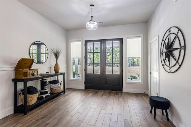 6301 144th Ave NE, Newalla, OK 74857 - foyer featuring french doors, wood finished floors, and baseboards