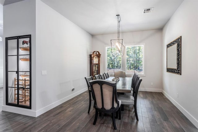 6301 144th Ave NE, Newalla, OK 74857 - dining room featuring dark wood-style flooring and baseboards