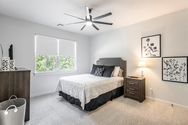 6301 144th Ave NE, Newalla, OK 74857 - carpeted bedroom with baseboards and ceiling fan