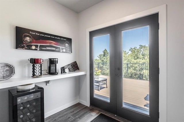 6301 144th Ave NE, Newalla, OK 74857 - doorway with dark wood-style flooring, beverage cooler, french doors, and baseboards