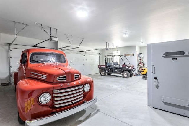 6301 144th Ave NE, Newalla, OK 74857 - garage with a garage door opener