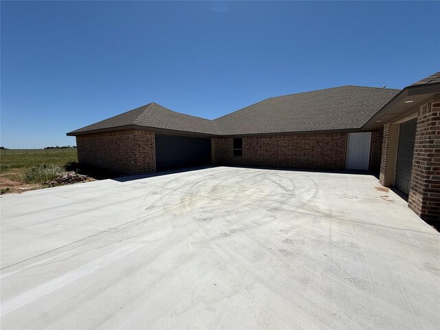 5 Old Glory Ave, Altus, OK 73521 - ranch-style home featuring a garage and brick siding
