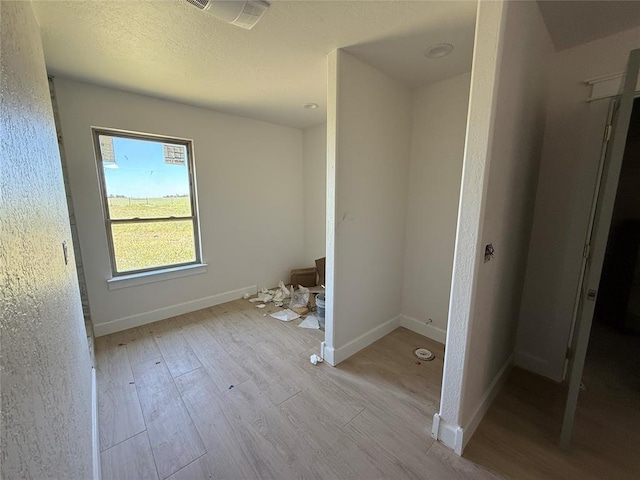 5 Old Glory Ave, Altus, OK 73521 - unfurnished bedroom featuring wood finished floors and baseboards