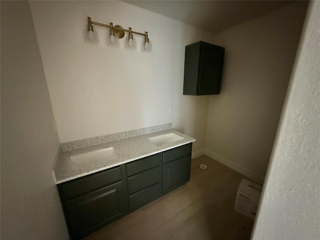 5 Old Glory Ave, Altus, OK 73521 - bathroom with wood finished floors and baseboards