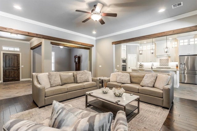 19633 Stratmore Way, Edmond, OK 73012 - living area featuring hardwood / wood-style flooring, ceiling fan, baseboards, crown molding, and recessed lighting
