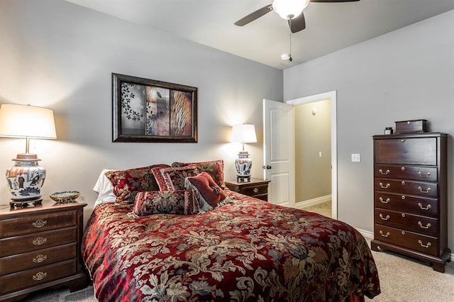 19633 Stratmore Way, Edmond, OK 73012 - carpeted bedroom with baseboards and a ceiling fan