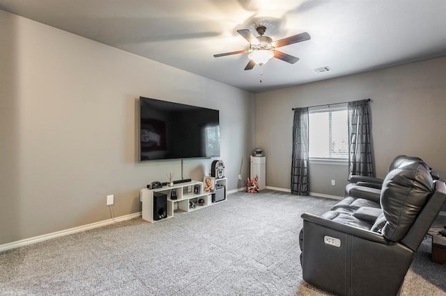 19633 Stratmore Way, Edmond, OK 73012 - living area featuring a ceiling fan, carpet, and baseboards