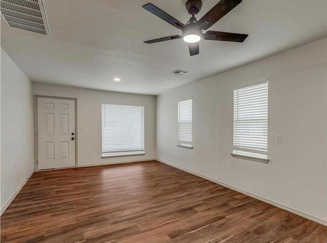 1619 SE 63rd St, Oklahoma City, OK 73149 - empty room featuring a ceiling fan, wood finished floors, baseboards, and recessed lighting