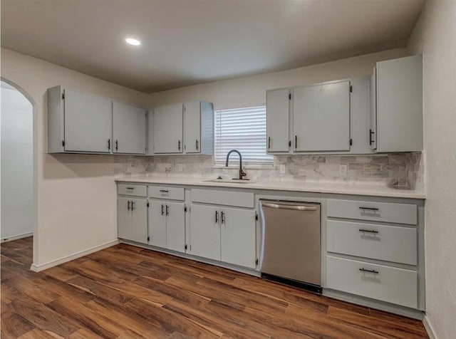 1619 SE 63rd St, Oklahoma City, OK 73149 - kitchen with a sink, tasteful backsplash, light countertops, stainless steel dishwasher, and recessed lighting