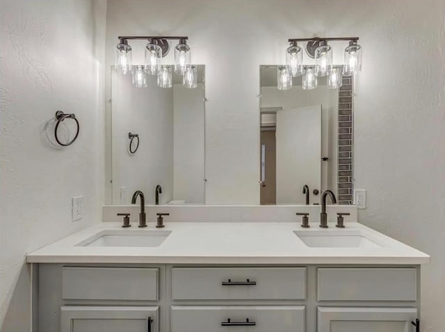 1619 SE 63rd St, Oklahoma City, OK 73149 - full bathroom with double vanity and a textured wall
