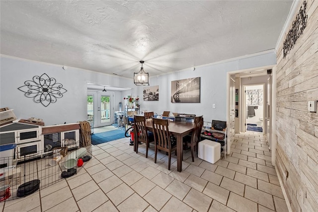 5505 S Villa Ave, Oklahoma City, OK 73119 - dining space with light tile patterned flooring, ornamental molding, and a textured ceiling