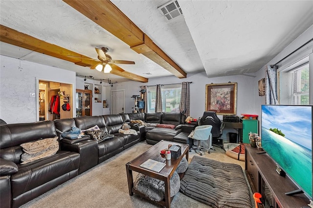 5505 S Villa Ave, Oklahoma City, OK 73119 - carpeted living room with beamed ceiling and ceiling fan