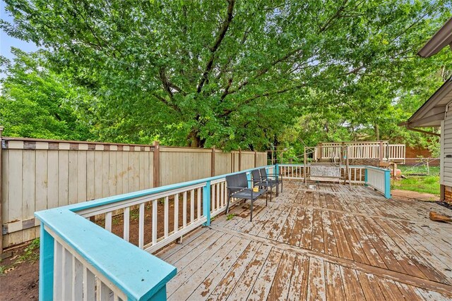 5505 S Villa Ave, Oklahoma City, OK 73119 - deck featuring a fenced backyard