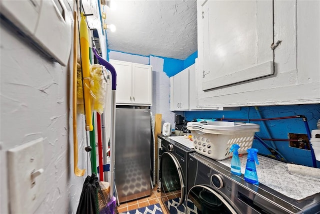 5505 S Villa Ave, Oklahoma City, OK 73119 - kitchen featuring freestanding refrigerator, washer / clothes dryer, white cabinetry, and tile patterned flooring