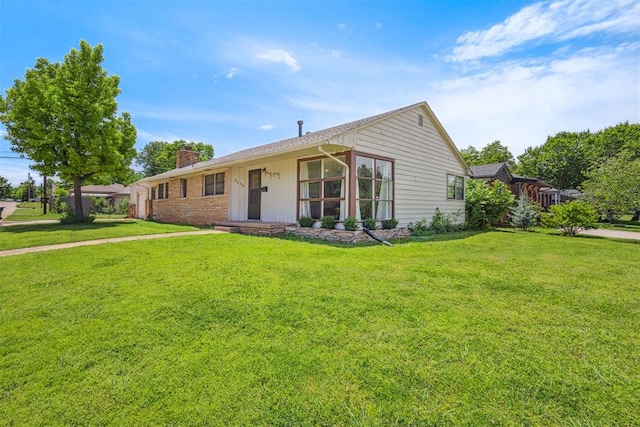 2600 NW 34th St, Oklahoma City, OK 731 - single story home with a chimney and a front yard