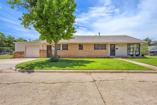 2600 NW 34th St, Oklahoma City, OK 731 - single story home featuring an attached garage, concrete driveway, a front yard, and brick siding