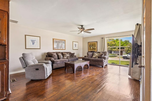 2600 NW 34th St, Oklahoma City, OK 731 - living room featuring ceiling fan, dark wood-style floors, and baseboards