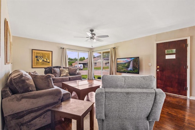 2600 NW 34th St, Oklahoma City, OK 731 - living room with a ceiling fan, dark wood-type flooring, and baseboards