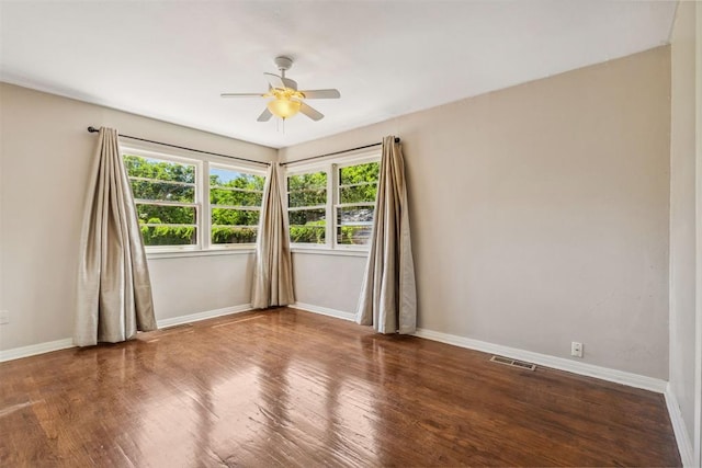 2600 NW 34th St, Oklahoma City, OK 731 - empty room featuring baseboards, a ceiling fan, and wood finished floors