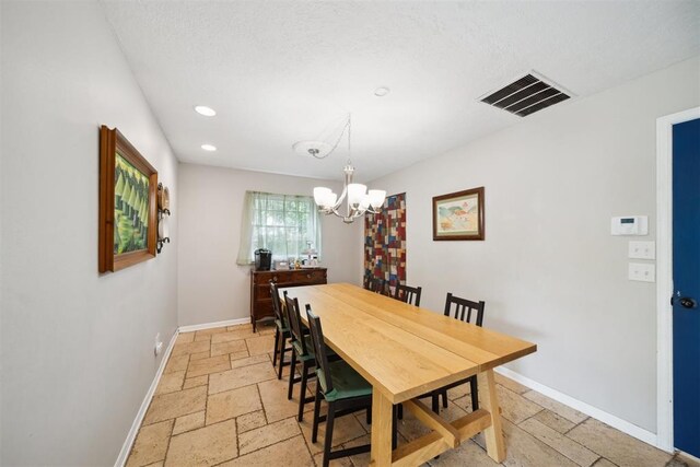 700 Nancy Lynn Ter, Norman, OK 73069 - dining area with stone tile floors, a chandelier, baseboards, and recessed lighting