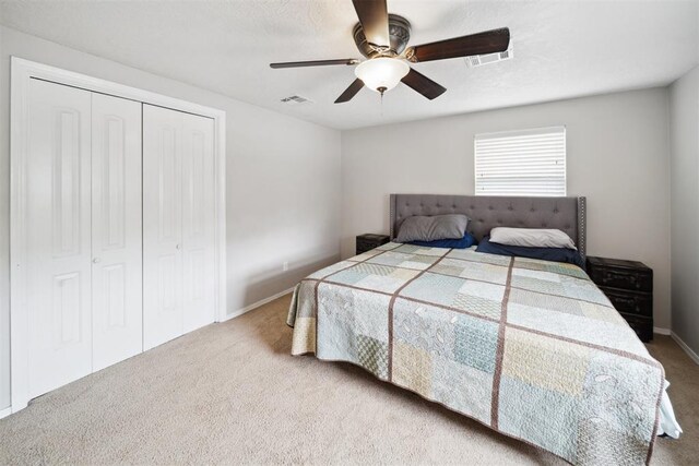 700 Nancy Lynn Ter, Norman, OK 73069 - bedroom with carpet, a closet, ceiling fan, and baseboards