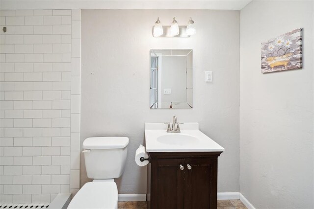 700 Nancy Lynn Ter, Norman, OK 73069 - bathroom with toilet, vanity, and baseboards