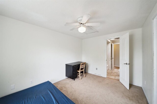 700 Nancy Lynn Ter, Norman, OK 73069 - unfurnished bedroom featuring carpet, ceiling fan, and baseboards