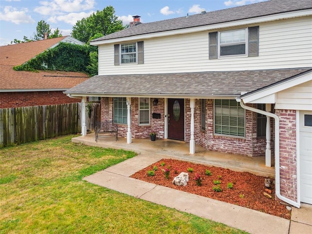 700 Nancy Lynn Ter, Norman, OK 73069 - traditional-style home featuring covered porch, brick siding, and a shingled roof