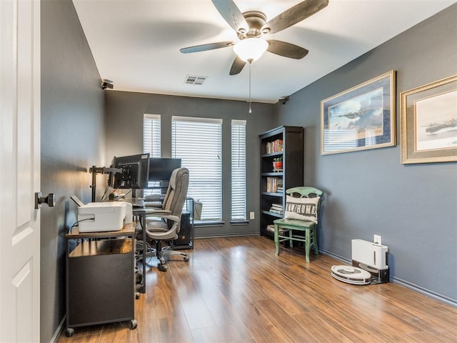 419 NE 23rd Ter, Newcastle, OK 73065 - office space with a ceiling fan, wood finished floors, and baseboards