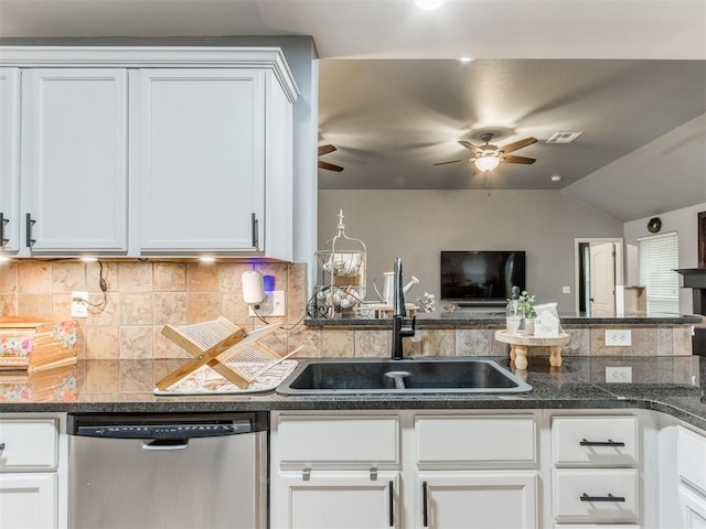 419 NE 23rd Ter, Newcastle, OK 73065 - kitchen featuring dishwasher, a sink, ceiling fan, backsplash, and open floor plan