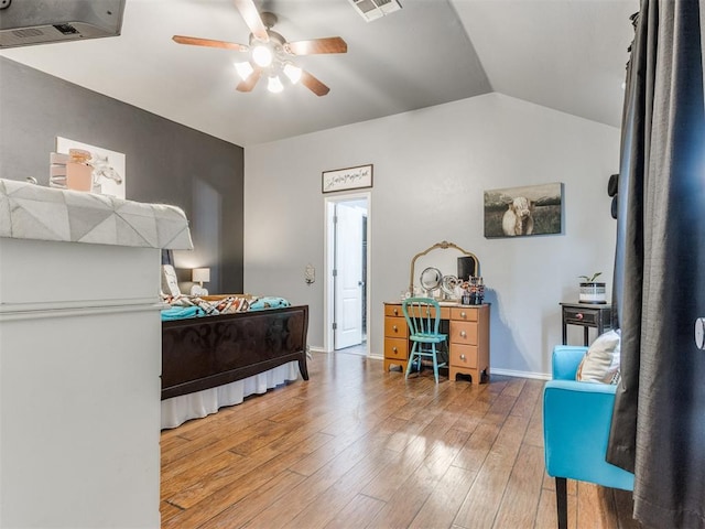 419 NE 23rd Ter, Newcastle, OK 73065 - bedroom featuring hardwood / wood-style floors, vaulted ceiling, baseboards, and a ceiling fan