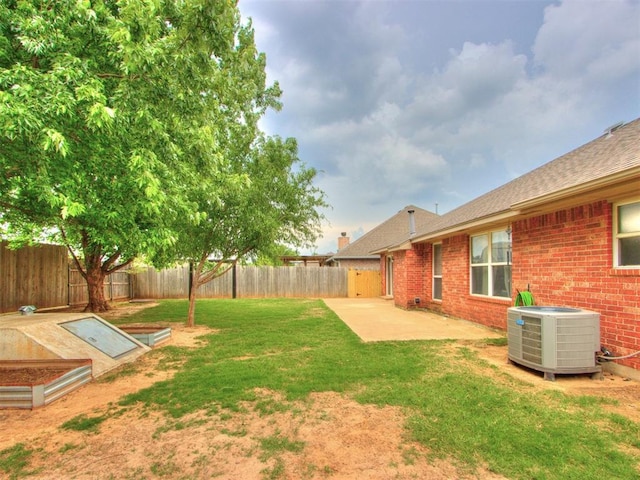 419 NE 23rd Ter, Newcastle, OK 73065 - view of yard featuring cooling unit and a patio area