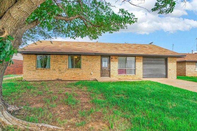 1904 Gemini St, Altus, OK 73521 - single story home with brick siding, driveway, an attached garage, a front yard, and a shingled roof
