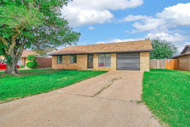 1904 Gemini St, Altus, OK 73521 - ranch-style house featuring brick siding, concrete driveway, and an attached garage