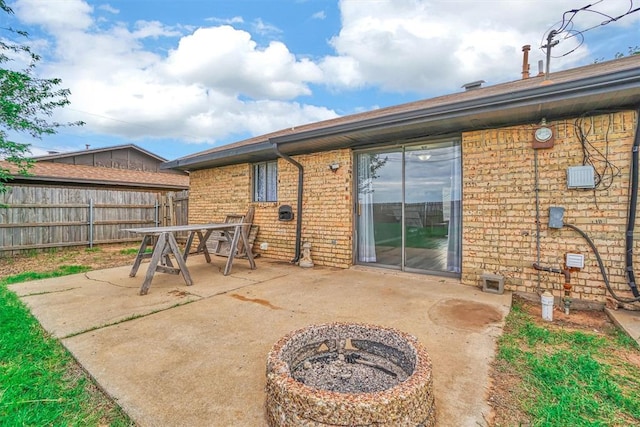 1904 Gemini St, Altus, OK 73521 - view of patio with an outdoor fire pit and outdoor dining area